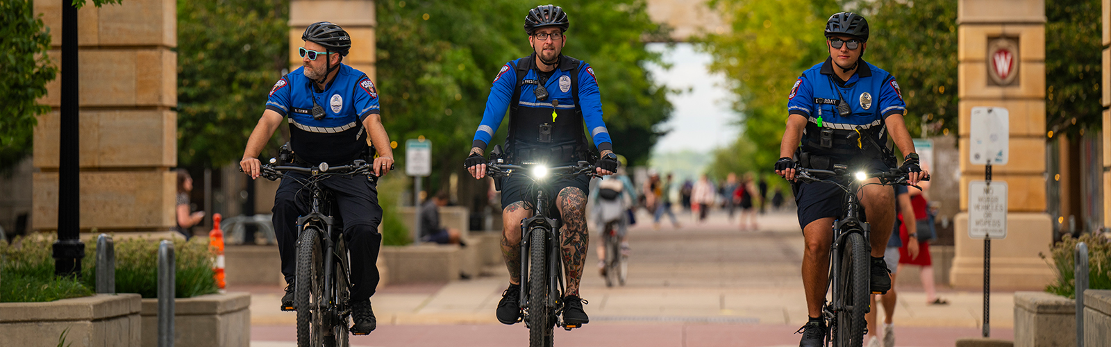 Three officers out on bike patrol